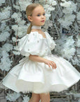girls model dress in white by Little Bedouin