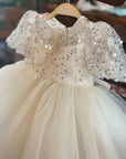 girl occasion dress in white by Little Bedouin