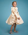luxury girl dress, stylish journey, captivating beige dress, cutting-edge fashion, modern aesthetics,فساتين اطفال فخمة