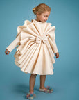 luxury girl dress, stylish journey, captivating beige dress, cutting-edge fashion, modern aesthetics,فساتين اطفال فخمة