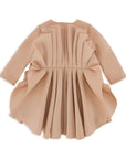 luxury girl dress, stylish journey, captivating beige dress, cutting-edge fashion, modern aesthetics,فساتين اطفال فخمة